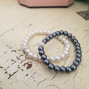 White and black/grey bracelets